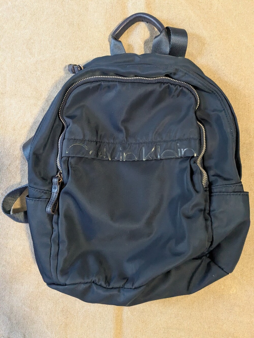 Calvin Klein Navy Blue Nylon Backpack w/Front, Back Zip Pockets Side Ph Pockets